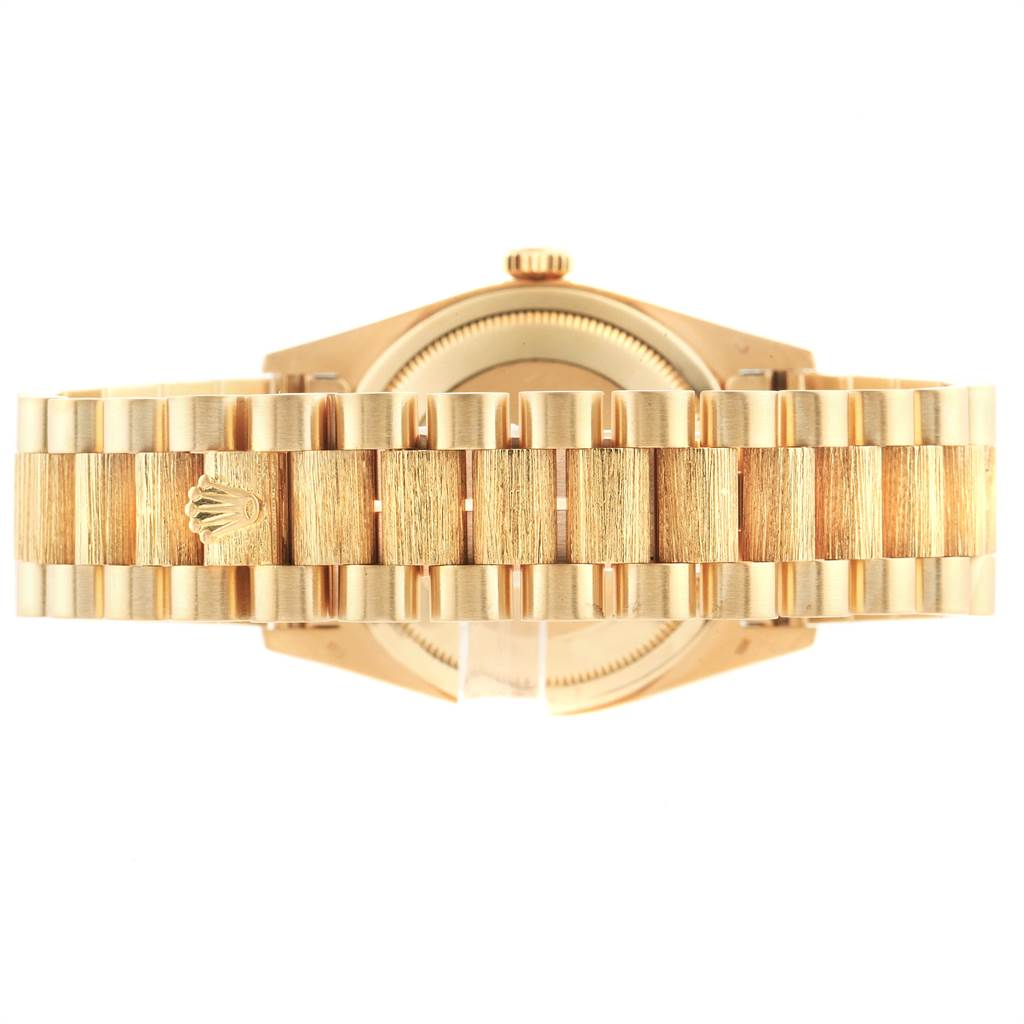 The image shows the back view of the gold bracelet and case of a Rolex President 18248 Men's Yellow Gold Champagne Dial 18248 Men's Yellow Gold Champagne Dial model watch.