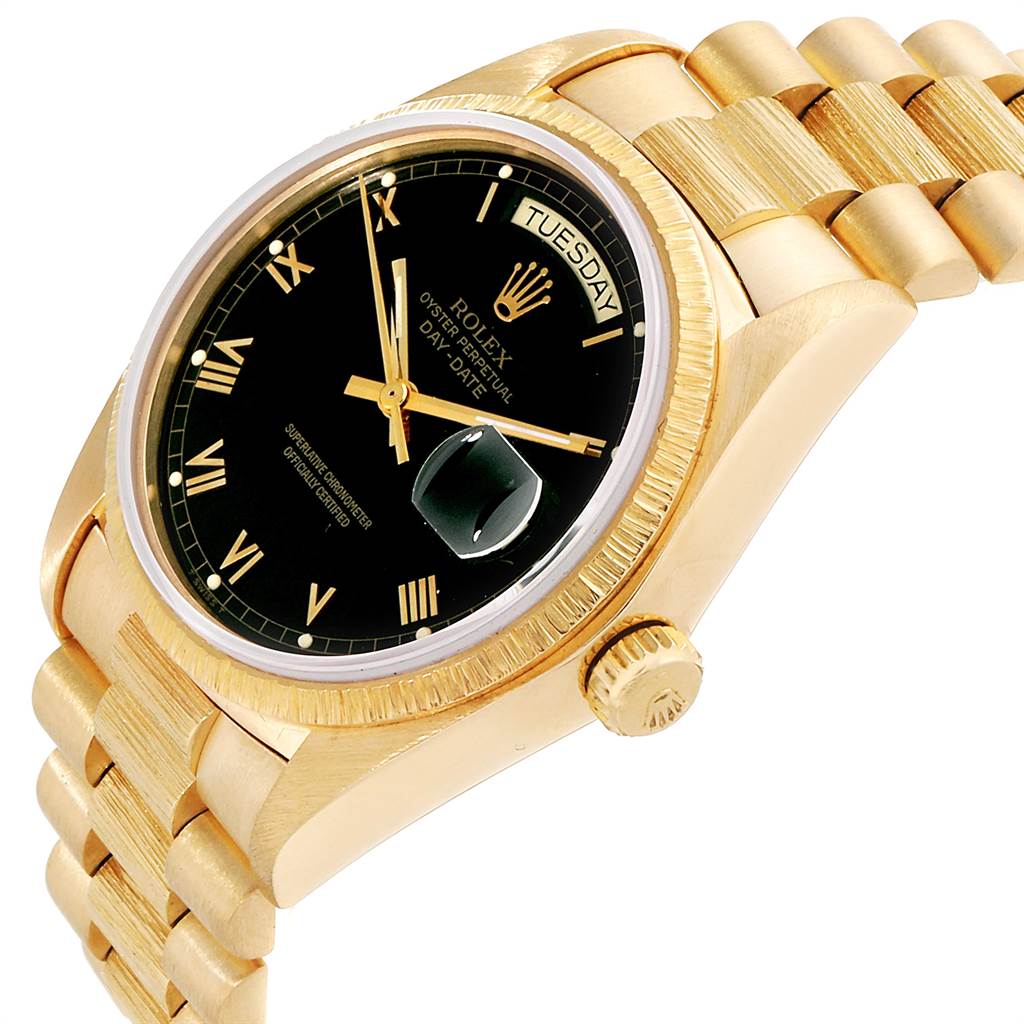 The image shows a side-angle view of a Rolex President 18038 Men
s Yellow Gold Black Dial 18038 Men
s Yellow Gold Black Dial model watch, highlighting its gold case, black dial, and bracelet.