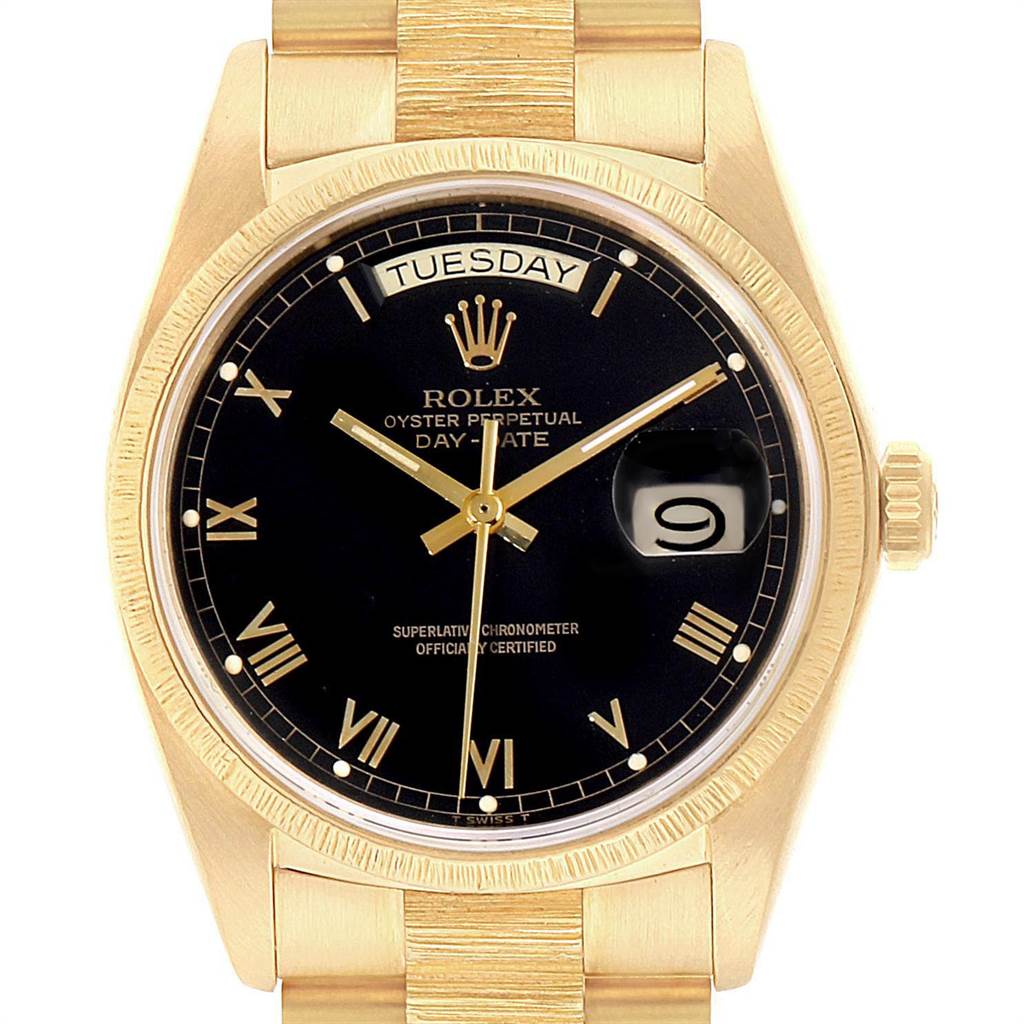 The image shows a front view of the Rolex President 18038 Men
s Yellow Gold Black Dial 18038 Men
s Yellow Gold Black Dial model watch, highlighting the black dial, day-date display, and gold case.