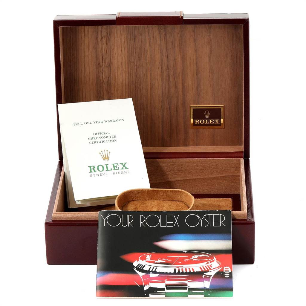 The image shows a Rolex President 18038 Men
s Yellow Gold Champagne Dial 18038 Men
s Yellow Gold Champagne Dial model watch box with warranty papers, chronometer certification, and a brochure.