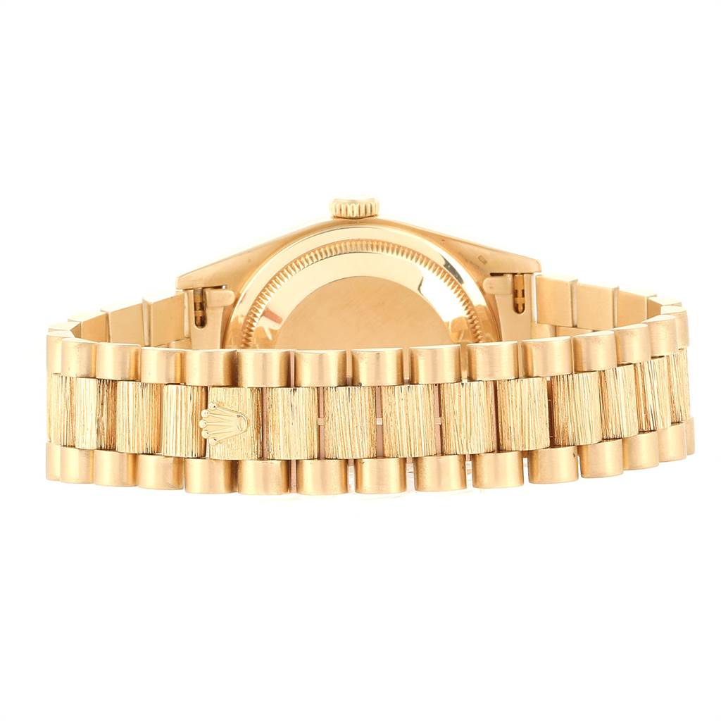 This image shows the back view of the Rolex President 18248 Men's Yellow Gold Champagne Dial 18248 Men's Yellow Gold Champagne Dial model, highlighting its gold bracelet and case back.