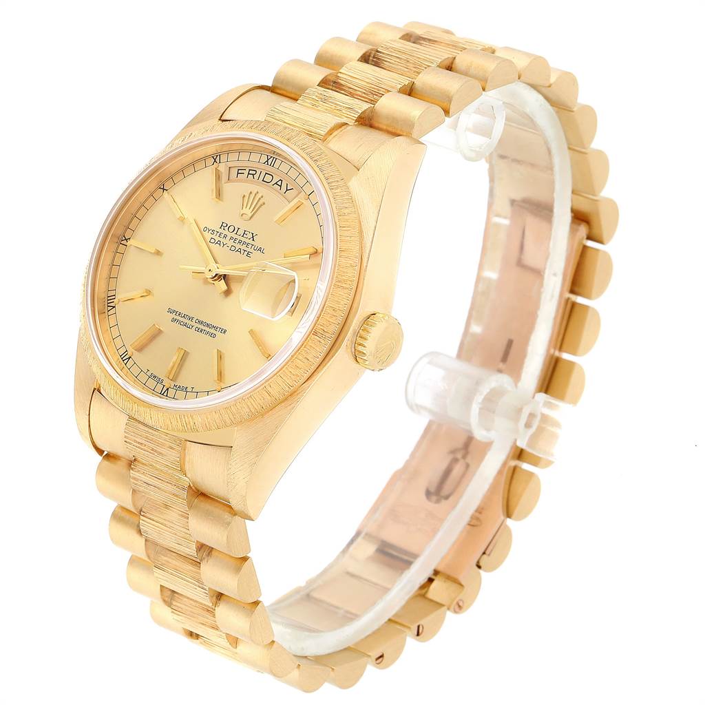 This is a Rolex President 18078 Men
s Yellow Gold Champagne Dial 18078 Men
s Yellow Gold Champagne Dial model watch shown from an angled side view displaying the face, bracelet, and crown.