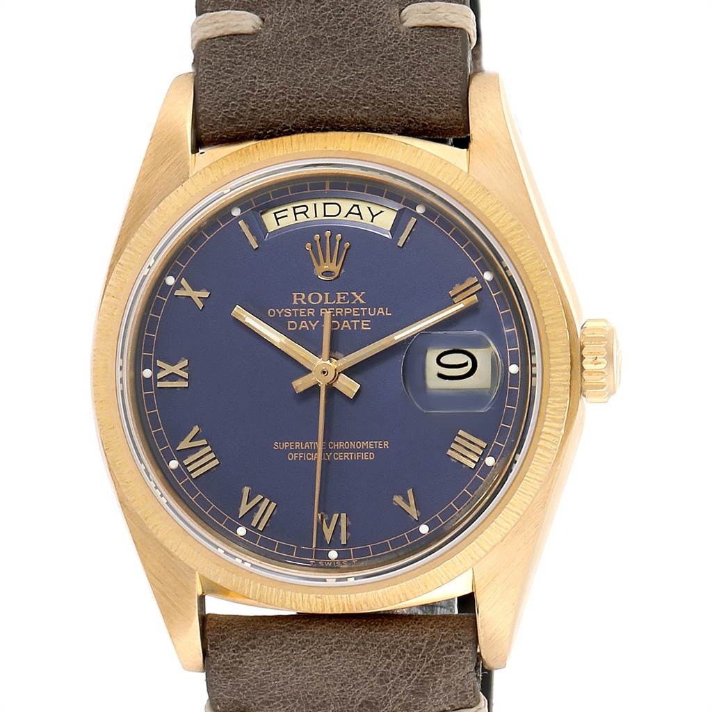 The Rolex President 18078 Men
s Yellow Gold Blue Dial 18078 Men
s Yellow Gold Blue Dial model watch is shown from the front, featuring its face, day-date display, and brown leather strap.