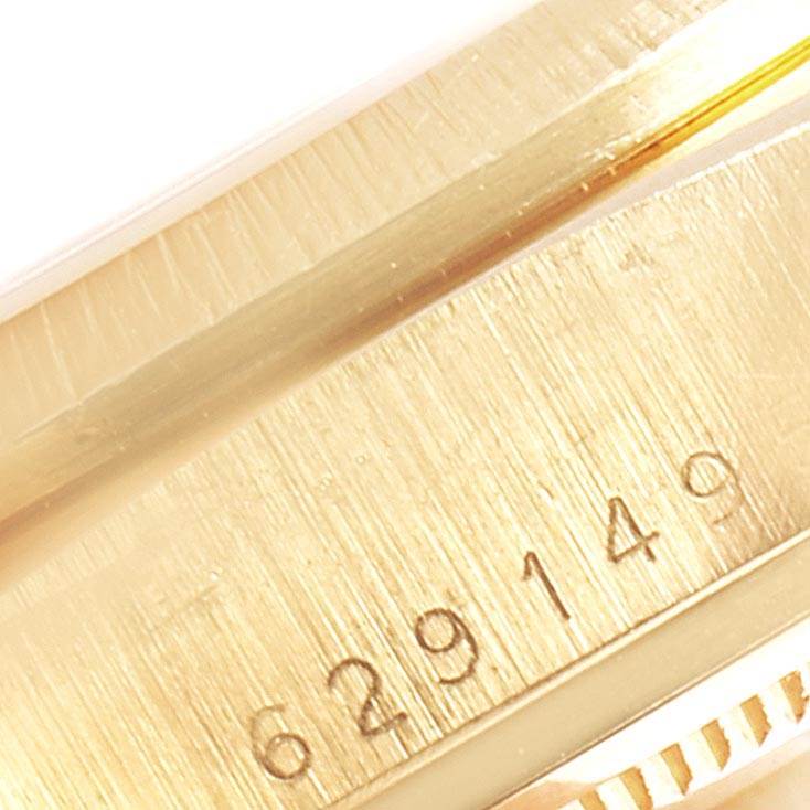 This close-up image shows the serial number engraved on the inner bezel of a Rolex President 18078 Men
s Yellow Gold Blue Dial 18078 Men
s Yellow Gold Blue Dial watch.