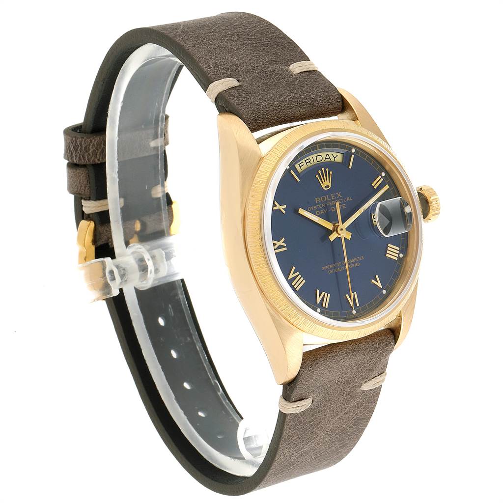 The image shows a Rolex President 18078 Men
s Yellow Gold Blue Dial 18078 Men
s Yellow Gold Blue Dial model watch from an angled side view, highlighting the face, bezel, crown, and strap.