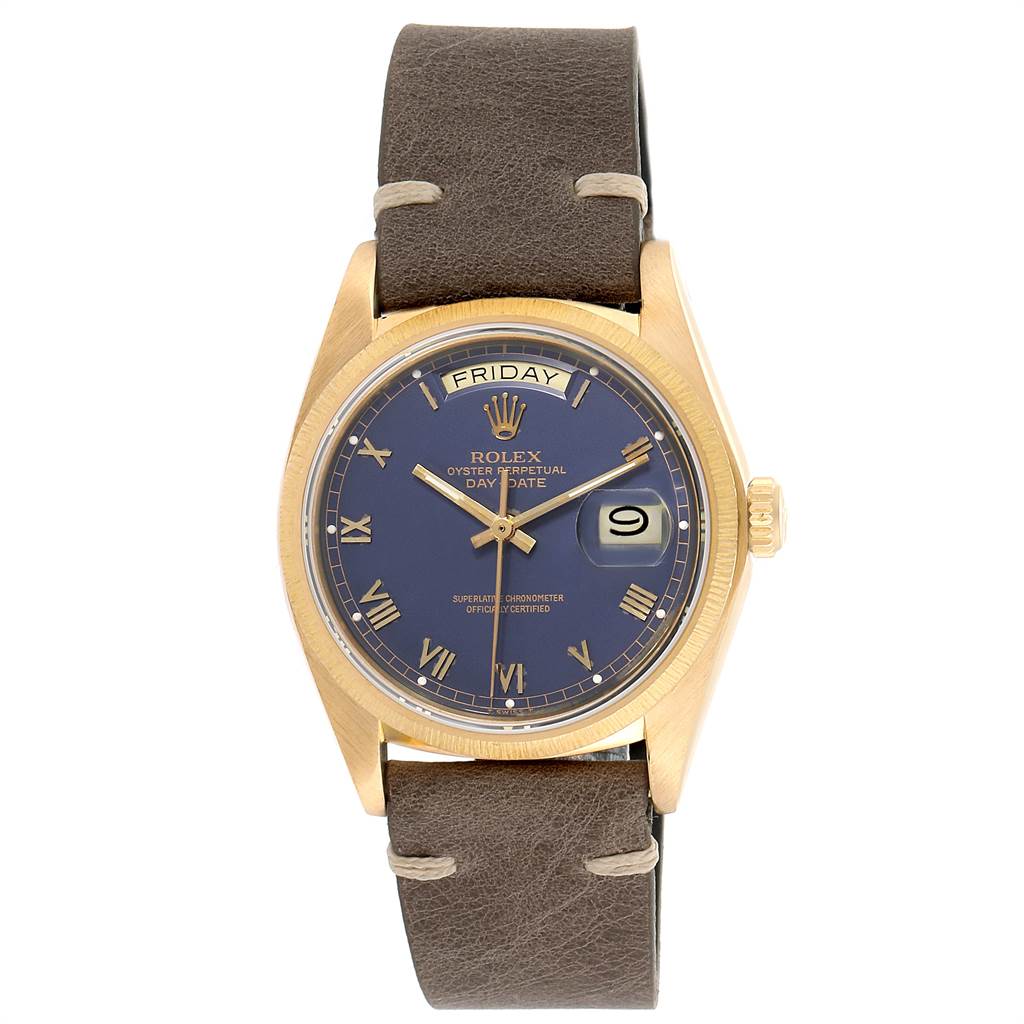 The image shows a front view of a Rolex President 18078 Men
s Yellow Gold Blue Dial 18078 Men
s Yellow Gold Blue Dial model watch with a gold case, blue dial, and brown leather strap.