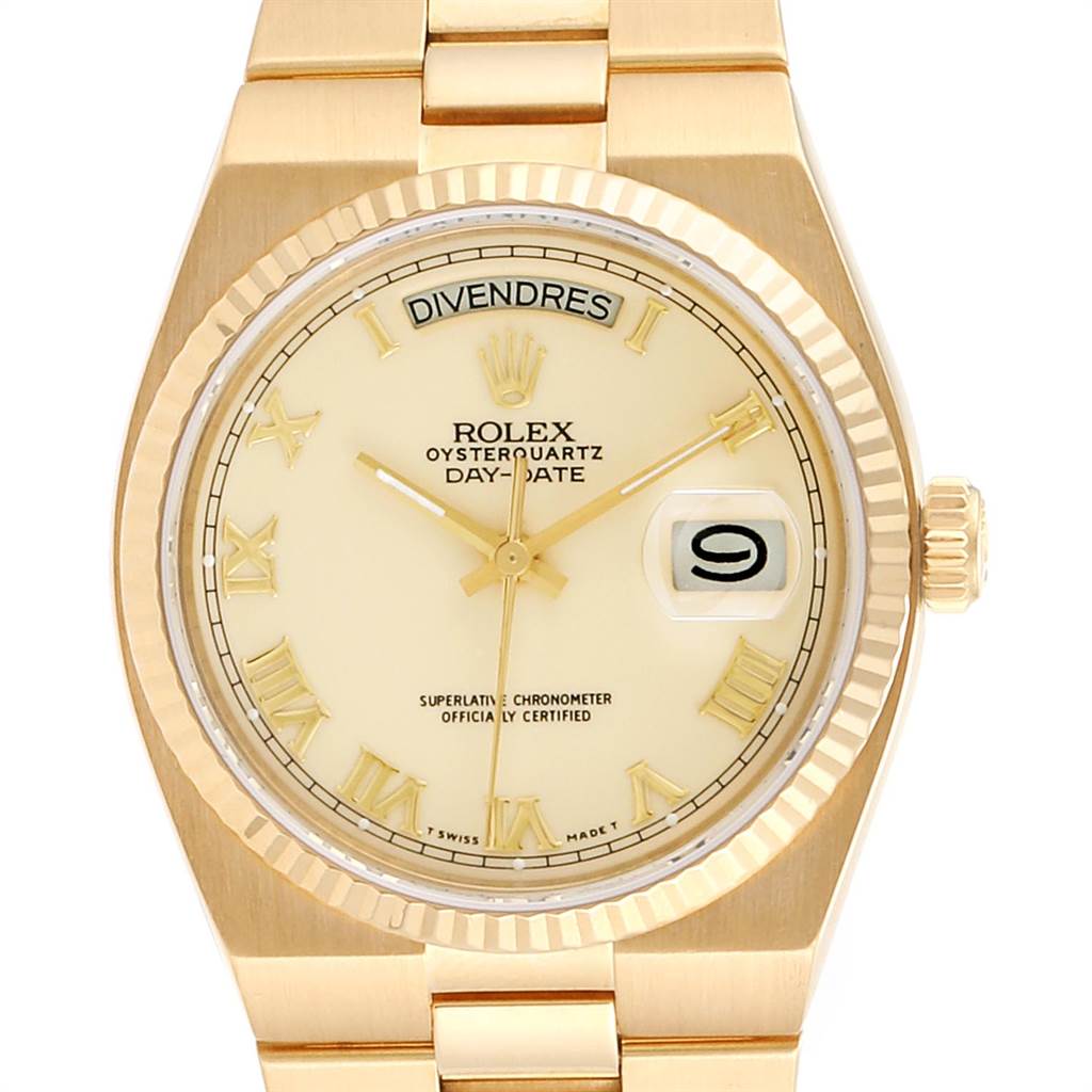 This image shows a front view of a Rolex President 19018 Men
s Yellow Gold Beige Dial 19018 Men
s Yellow Gold Beige Dial Oysterquartz Day-Date watch, highlighting the dial, hands, and day-date window.