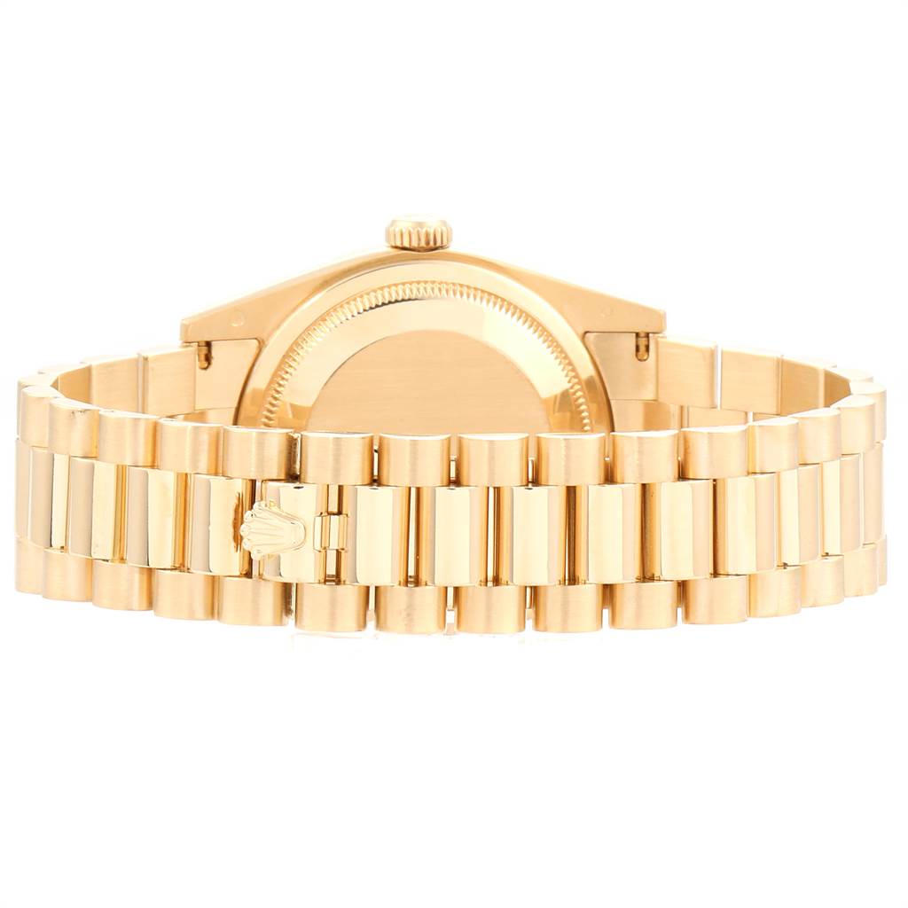 The image shows the back view of a Rolex President 118388 Men's Yellow Gold Mother of Pearl Dial 118388 Men's Yellow Gold Mother of Pearl Dial model watch, highlighting its bracelet and clasp.