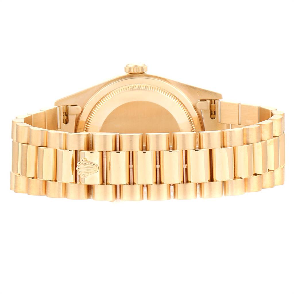 The image shows the Rolex President 18238 Men's Yellow Gold Champagne Dial 18238 Men's Yellow Gold Champagne Dial model watch from the back, highlighting the case back and the bracelet with a clasp.