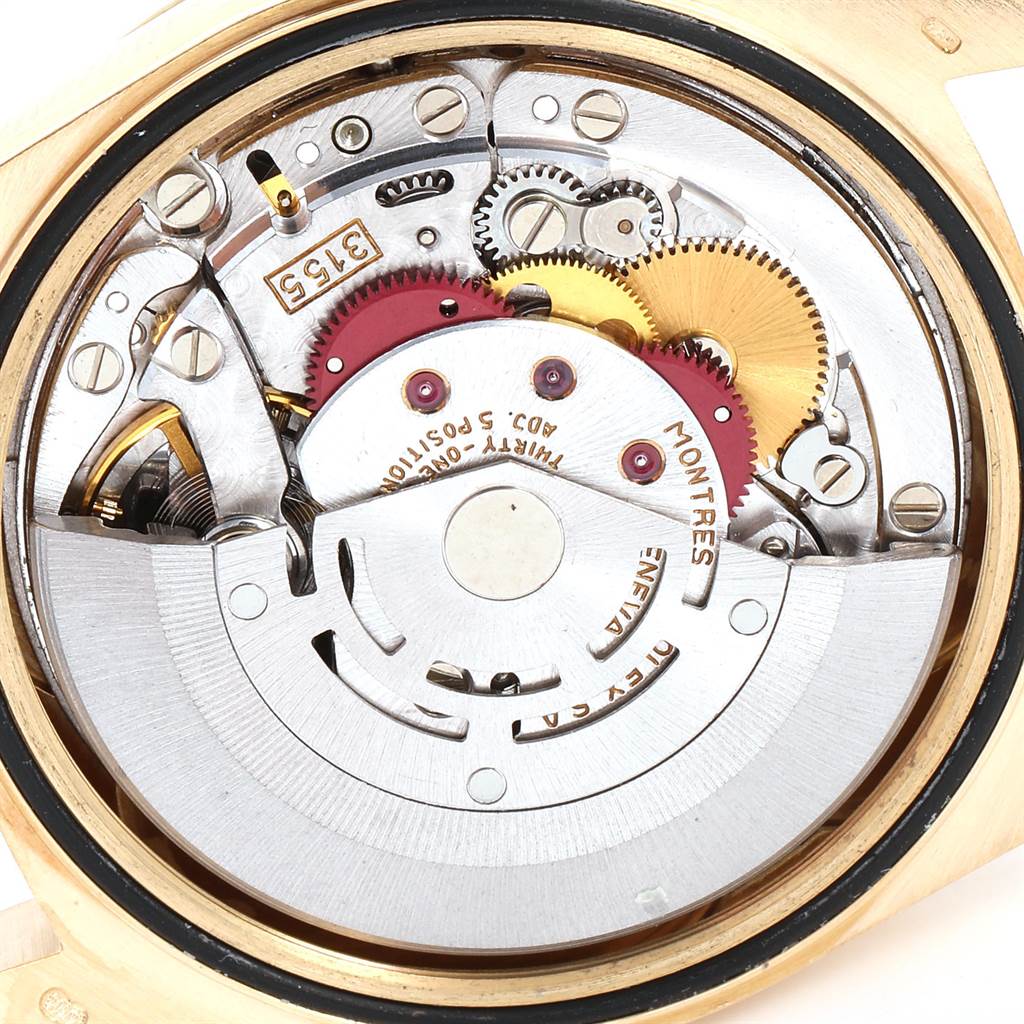 This is a close-up view of the movement inside a Rolex President 18238 Men's Yellow Gold Champagne Dial 18238 Men's Yellow Gold Champagne Dial model watch, showing gears and mechanical parts.