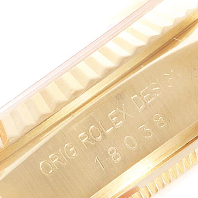 The image shows a close-up of the fluted bezel and case back of a Rolex President 18038 Men's Yellow Gold Champagne Dial 18038 Men's Yellow Gold Champagne Dial model watch.