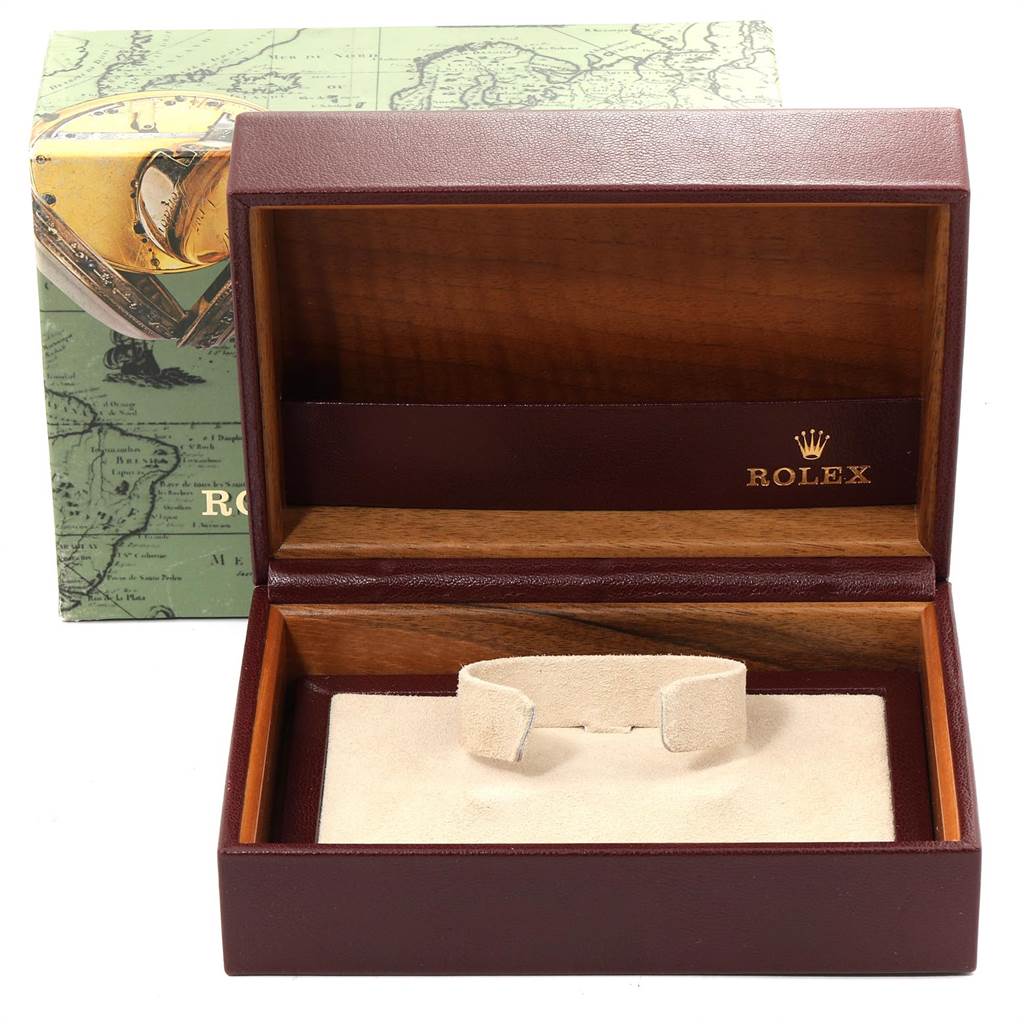 This image shows an open Rolex President 19018 Men's Yellow Gold Black Dial 19018 Men's Yellow Gold Black Dial model watch box, displaying branding and cushioned interior support.