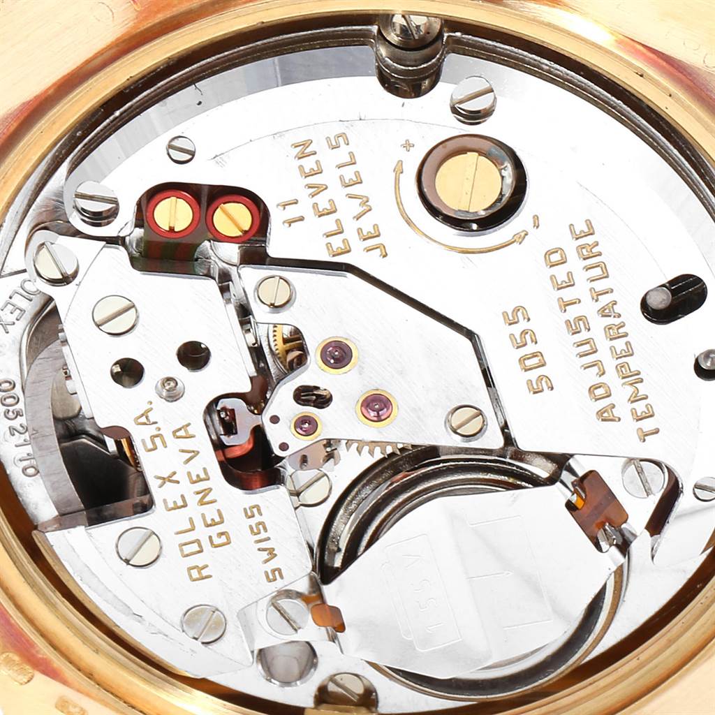 This close-up shot shows the intricate internal mechanism of the President model by Rolex.