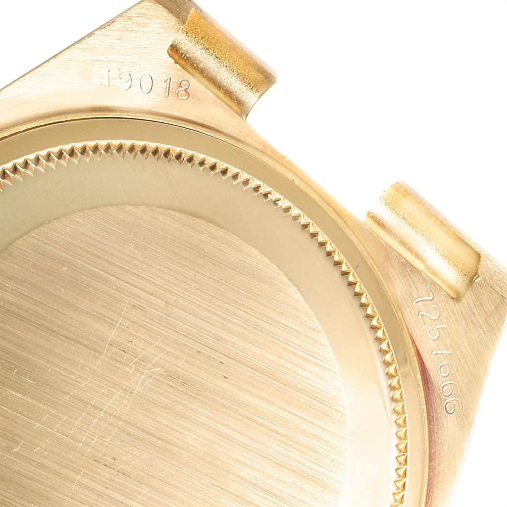 The image shows a close-up of the case back and lug area of a Rolex President 19018 Men's Yellow Gold Black Dial 19018 Men's Yellow Gold Black Dial watch.