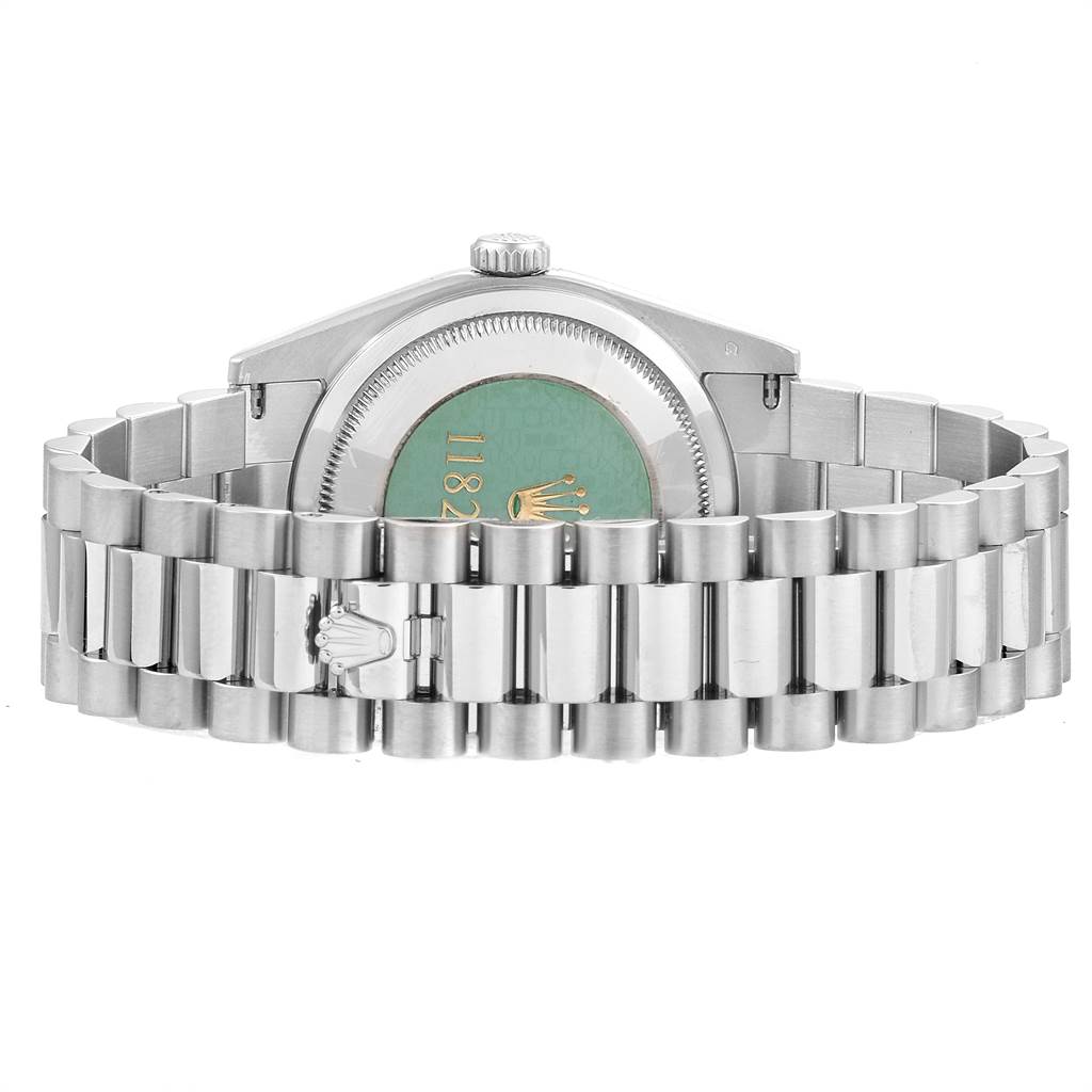 The image shows the back case and bracelet of a Rolex President 118209 Men
s White Gold White Dial 118209 Men
s White Gold White Dial model watch, viewed from the rear.