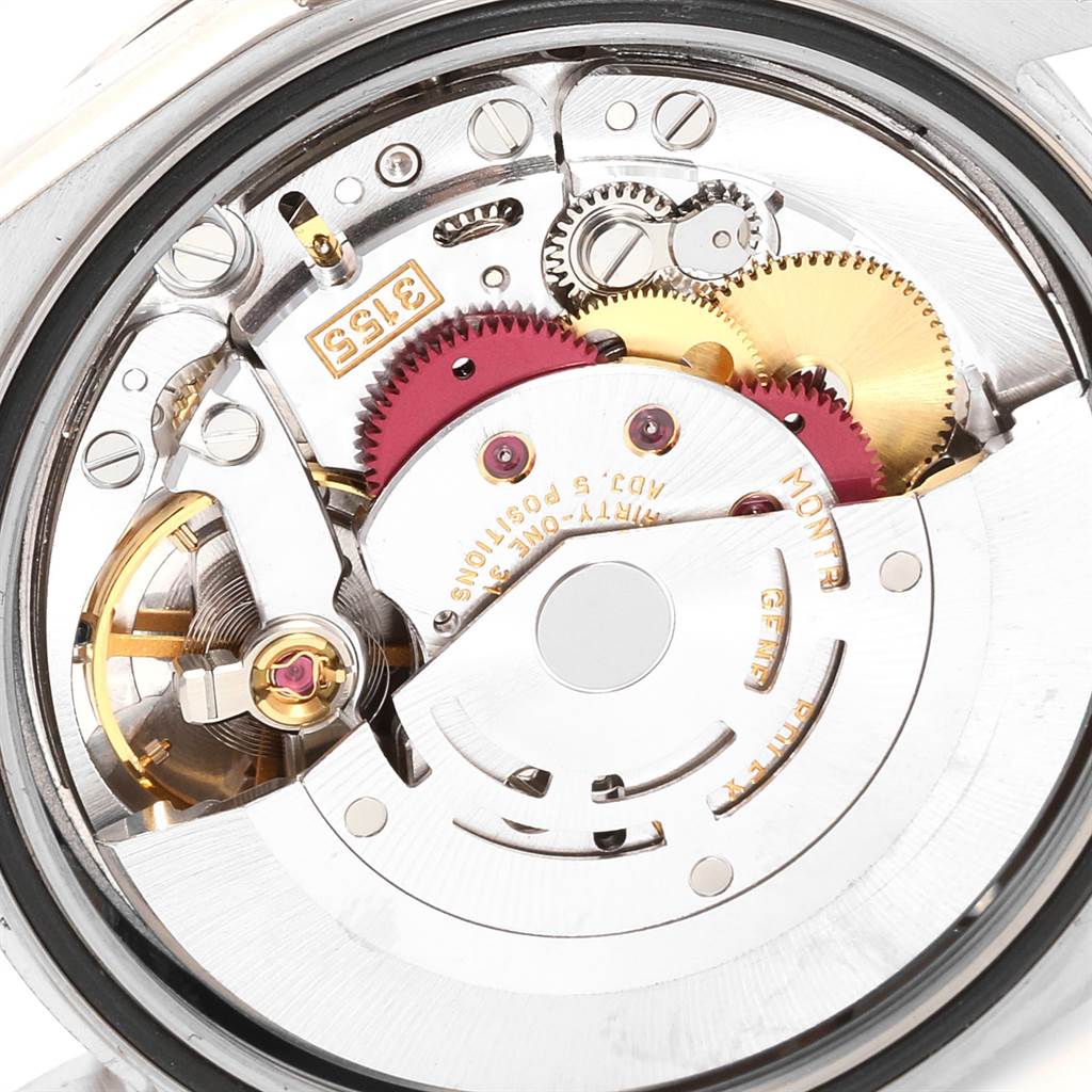 The image shows the inner mechanical movement of a Rolex President 118209 Men
s White Gold White Dial 118209 Men
s White Gold White Dial model watch from a close-up, rear angle.
