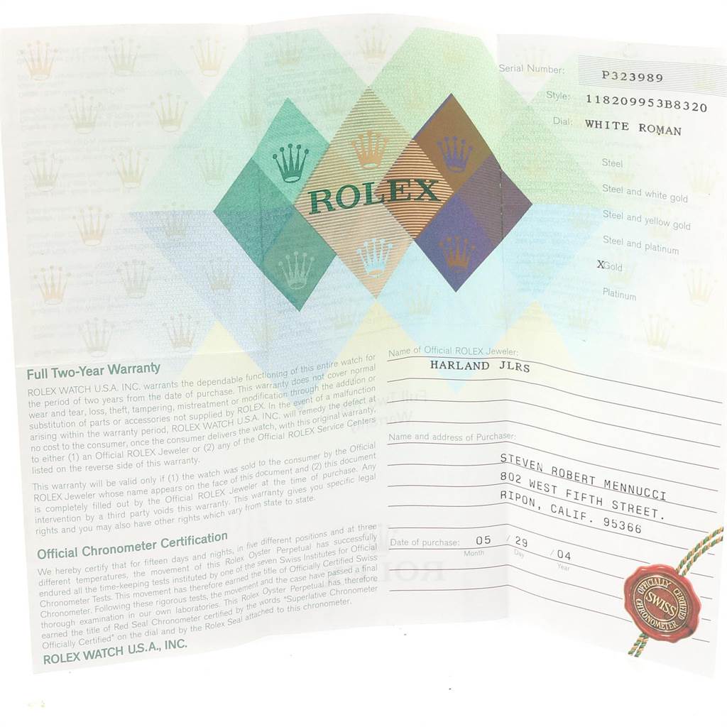 This image shows the warranty and certification papers for a Rolex President 118209 Men
s White Gold White Dial 118209 Men
s White Gold White Dial model watch.