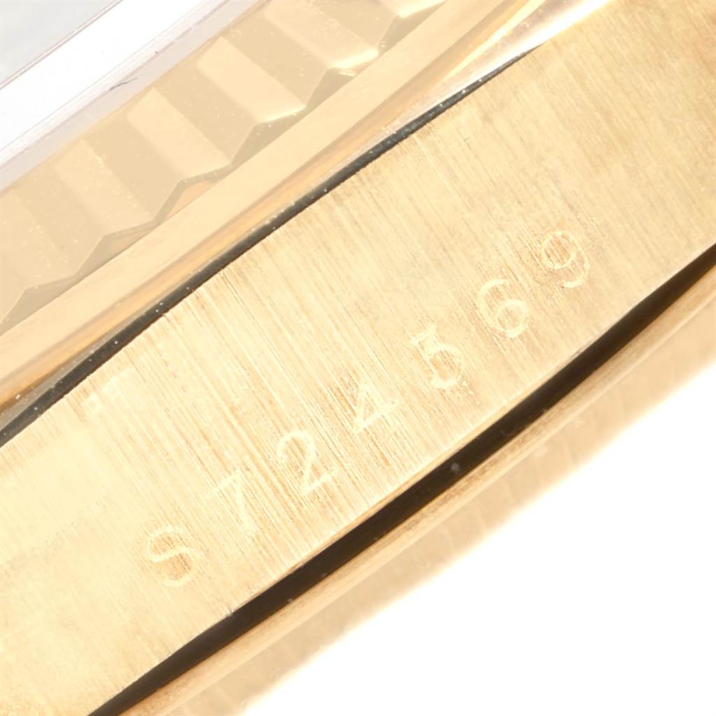 This close-up shows the serial number engraving on the side of the case of a Rolex President 18238 Men
s Yellow Gold Champagne Dial 18238 Men
s Yellow Gold Champagne Dial model watch.
