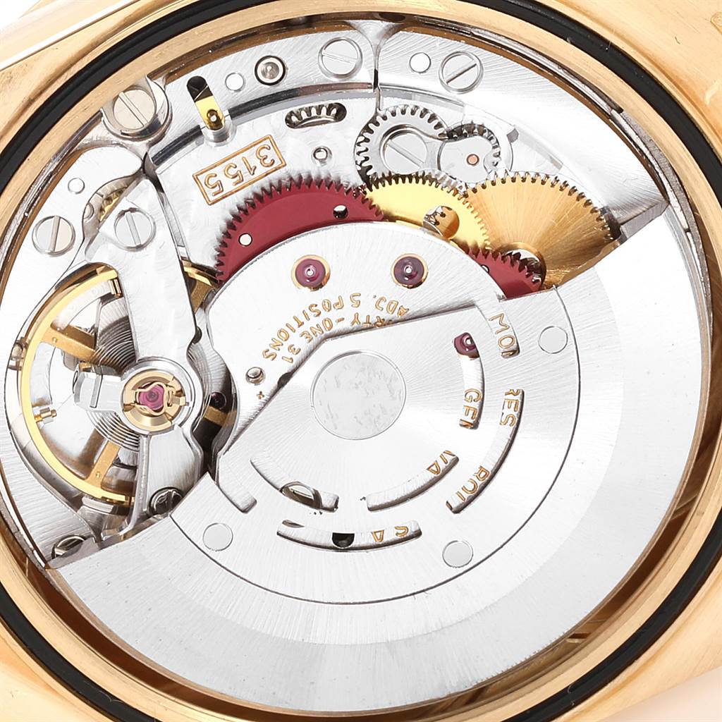 The image shows the internal mechanical movement of the Rolex President 18238 Men
s Yellow Gold Mother of Pearl Dial 18238 Men
s Yellow Gold Mother of Pearl Dial model watch from a close-up angle.