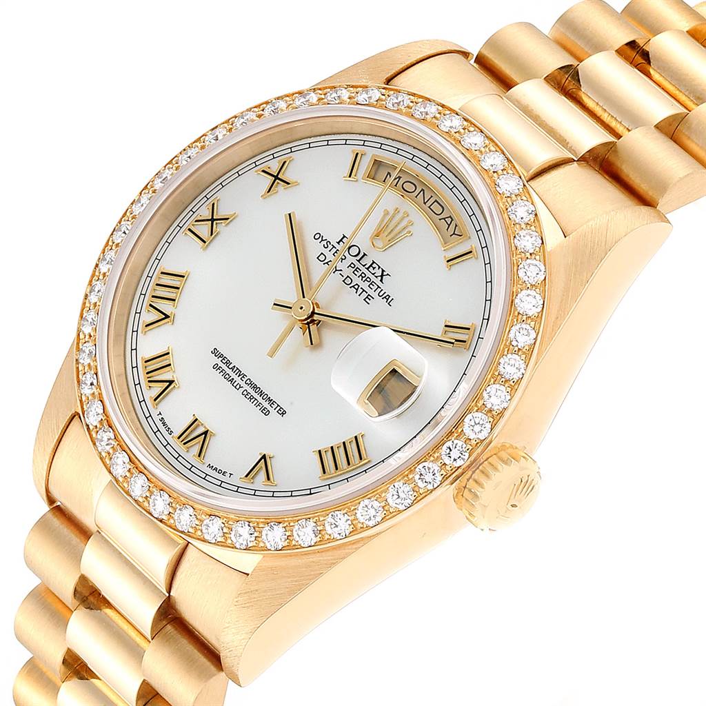 The image shows a close-up angle of a Rolex President 18238 Men
s Yellow Gold Mother of Pearl Dial 18238 Men
s Yellow Gold Mother of Pearl Dial model watch, highlighting its dial, bezel, and part of the bracelet.
