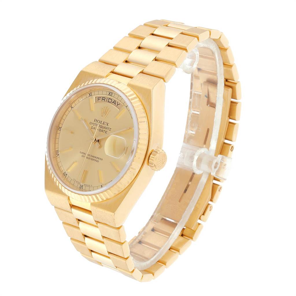 This image shows a Rolex President 19018 Men
s Yellow Gold Champagne Dial 19018 Men
s Yellow Gold Champagne Dial model watch angled from the top right, highlighting the dial, crown, and part of the band.