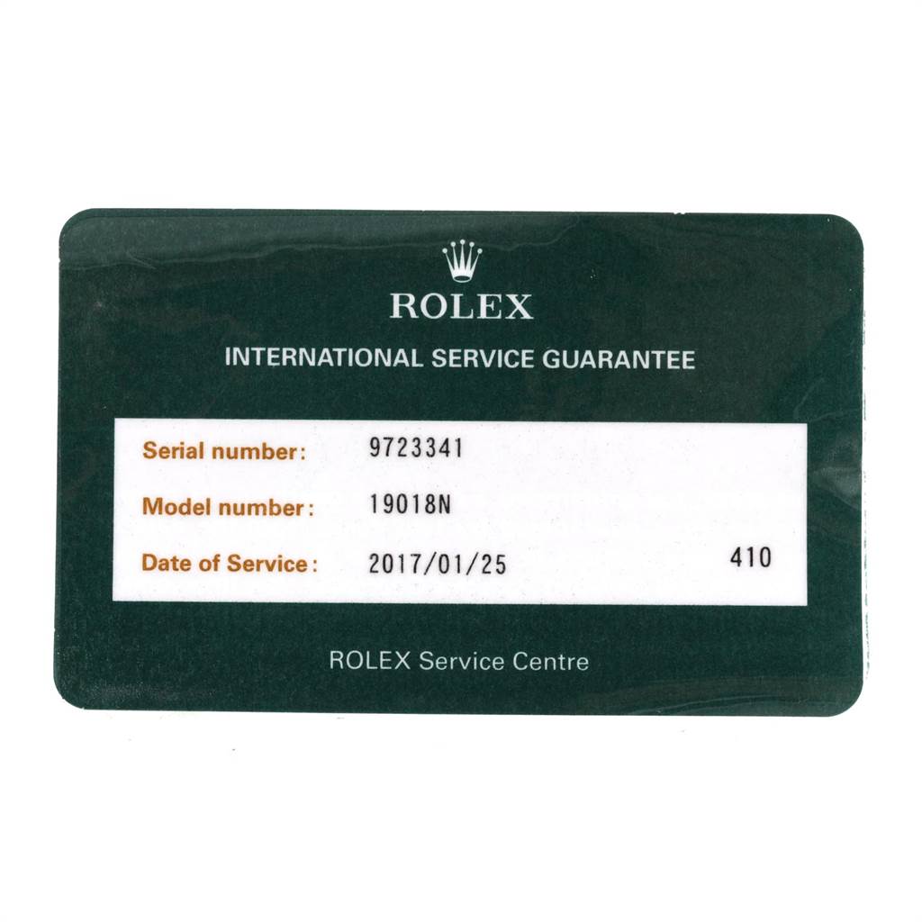 The image shows a service guarantee card for a Rolex President 19018 Men
s Yellow Gold Champagne Dial 19018 Men
s Yellow Gold Champagne Dial model watch, displaying serial and model numbers.