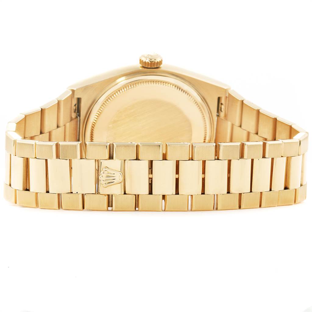 This image shows the back view of a Rolex President 16240 Men
s Yellow Gold Champagne Dial 16240 Men
s Yellow Gold Champagne Dial model watch, focusing on the bracelet and caseback.