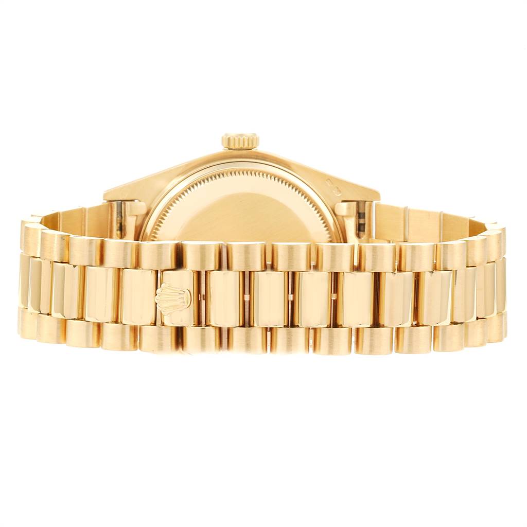 The image shows the back view of a Rolex President 18038 Men's Yellow Gold Blue Dial 18038 Men's Yellow Gold Blue Dial model watch, highlighting the gold bracelet and case.