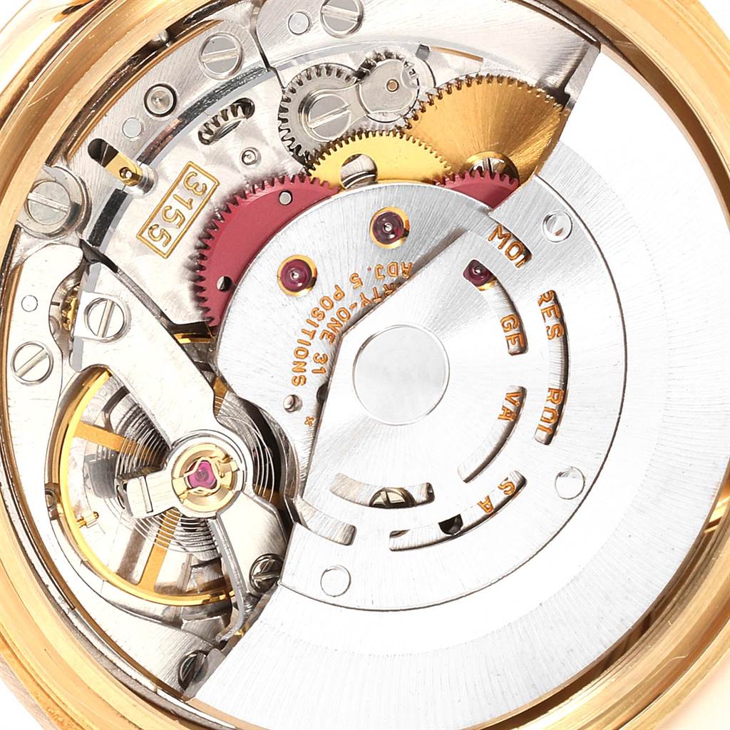 The image shows the internal mechanism of a Rolex President 18238 Men
s Yellow Gold Champagne Dial 18238 Men
s Yellow Gold Champagne Dial model watch from a rear angle.
