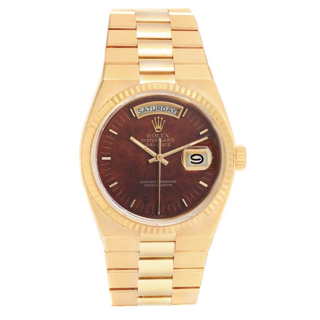 The Rolex President 14418 Men
s Yellow Gold Brown Dial 14418 Men
s Yellow Gold Brown Dial model watch is shown from a top-down angle, highlighting the dial, bracelet, and bezel.