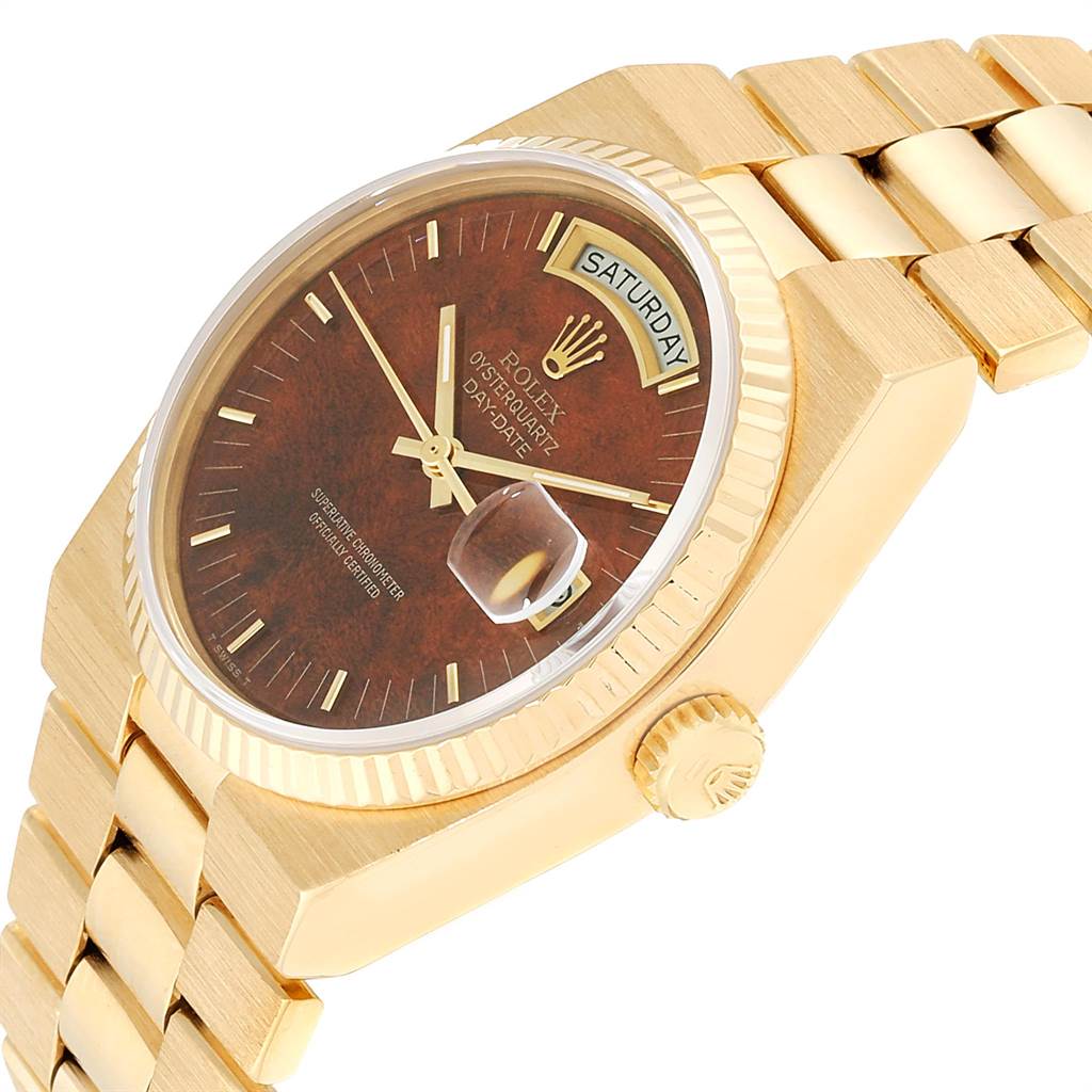 The image shows a close-up angled view of the Rolex President 14418 Men
s Yellow Gold Brown Dial 14418 Men
s Yellow Gold Brown Dial watch featuring its dial, bezel, crown, and part of the bracelet.