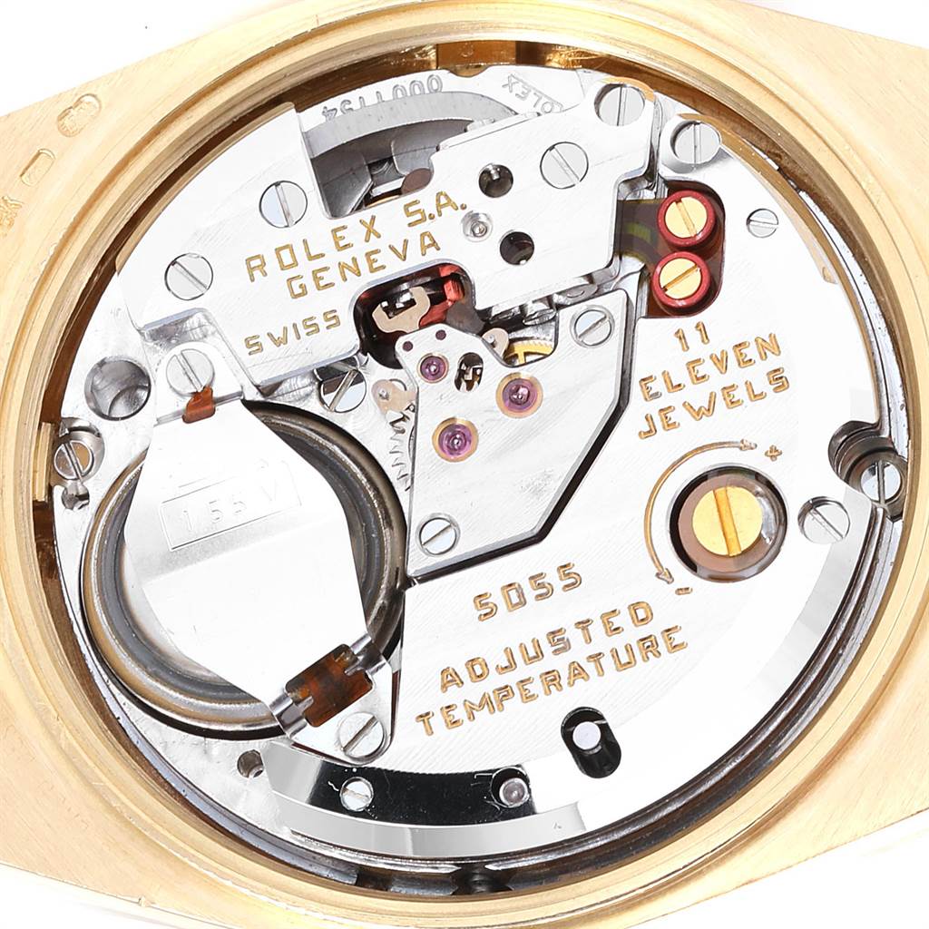 This image shows the inner mechanism of a Rolex President 14418 Men
s Yellow Gold Brown Dial 14418 Men
s Yellow Gold Brown Dial model watch, highlighting the movement and intricate details.