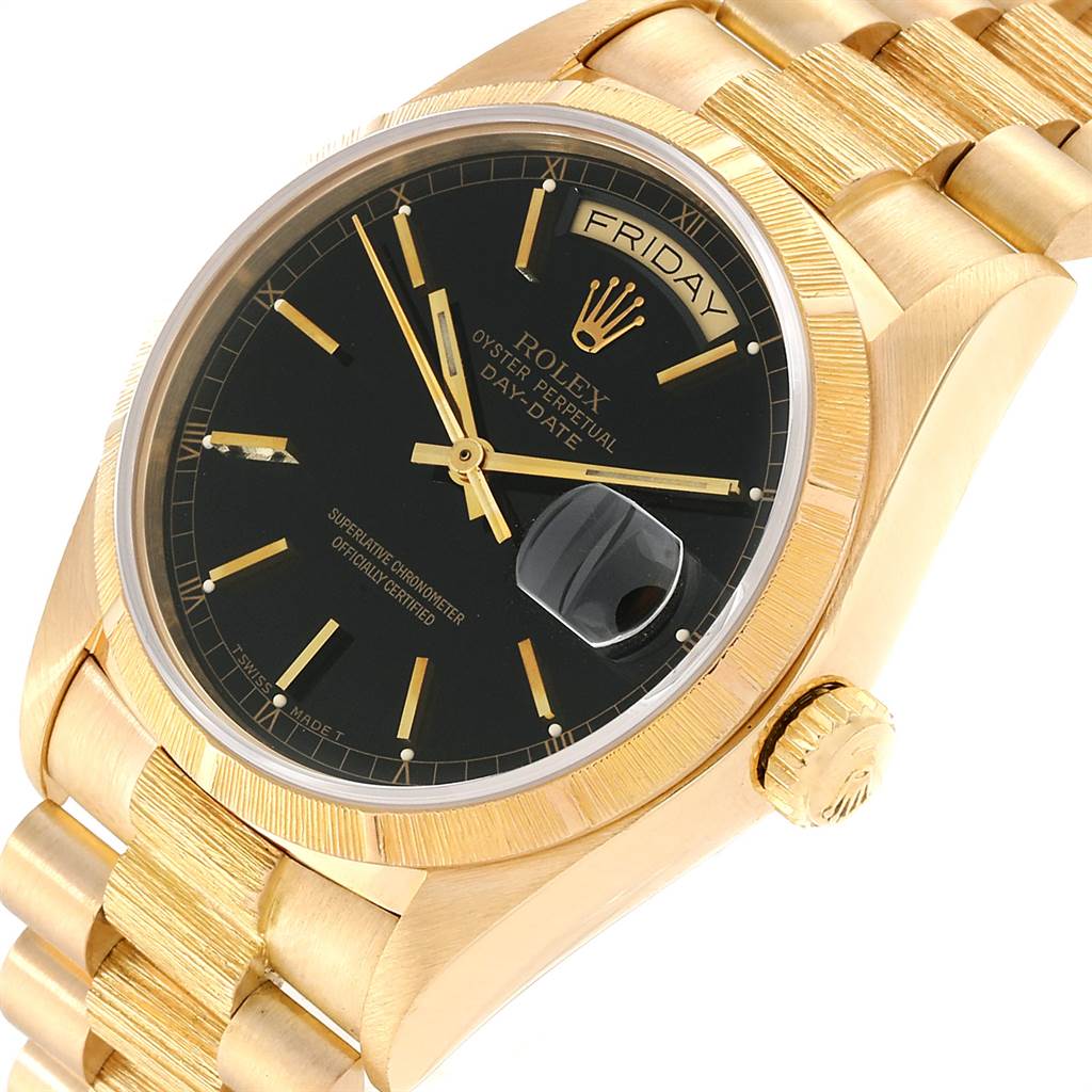 The image shows a close-up angled view of a Rolex President 18078 Men
s Yellow Gold Black Dial 18078 Men
s Yellow Gold Black Dial model, highlighting its gold case, black dial, and bracelet.