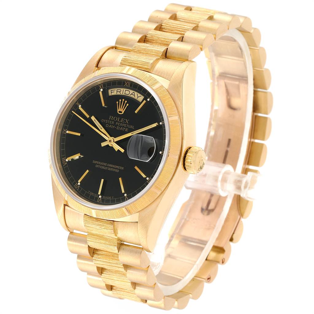 The image shows a Rolex President 18078 Men
s Yellow Gold Black Dial 18078 Men
s Yellow Gold Black Dial model watch at a three-quarter angle, highlighting the gold bracelet, black dial, and day-date display.