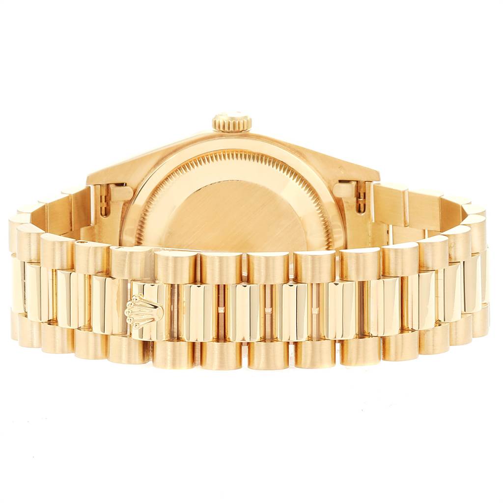This image shows the backside and bracelet of a Rolex President 18238 Men
s Yellow Gold Champagne Dial 18238 Men
s Yellow Gold Champagne Dial model watch in gold.