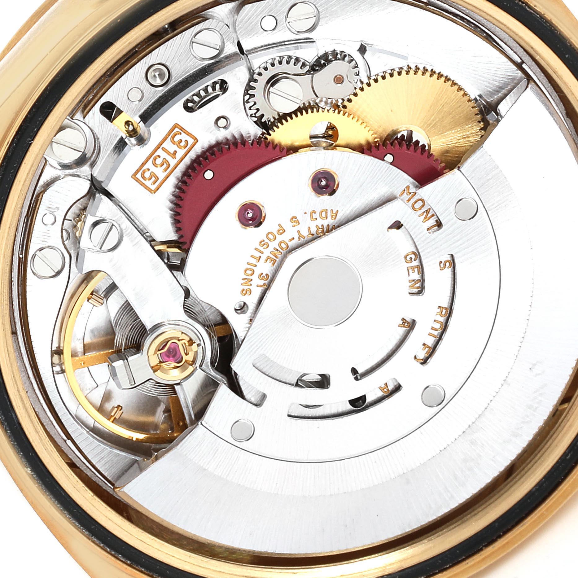 This image shows a close-up of the intricate internal mechanism of a Rolex President 18208 Men's Yellow Gold Blue Dial 18208 Men's Yellow Gold Blue Dial model watch.