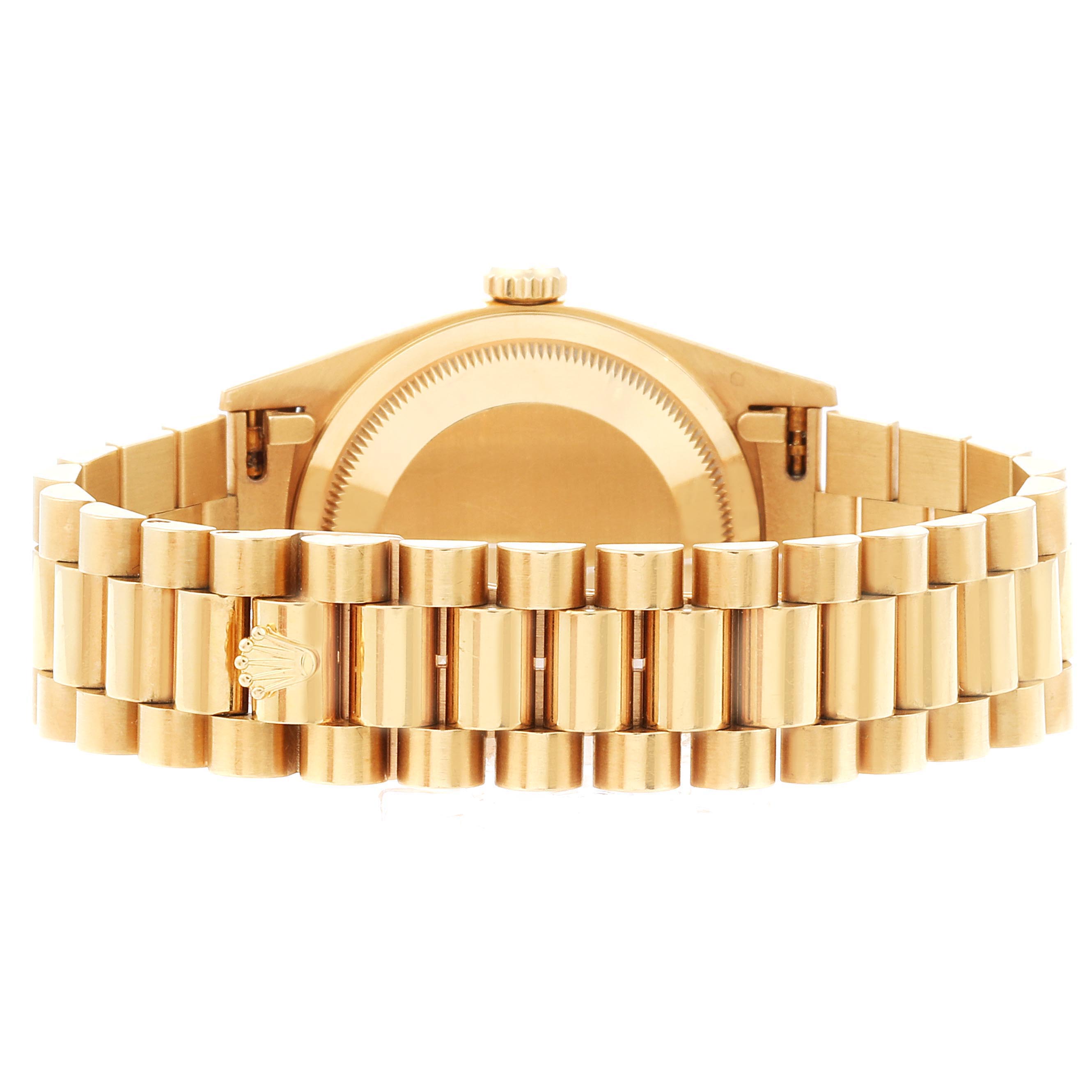 This image shows the back view of the Rolex President 18208 Men's Yellow Gold Blue Dial 18208 Men's Yellow Gold Blue Dial model watch, highlighting its case and gold bracelet.