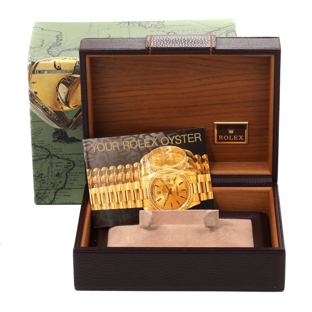The image shows the open box, manual, and cushion for a Rolex President 18038 Men's Yellow Gold Champagne Dial 18038 Men's Yellow Gold Champagne Dial model watch.