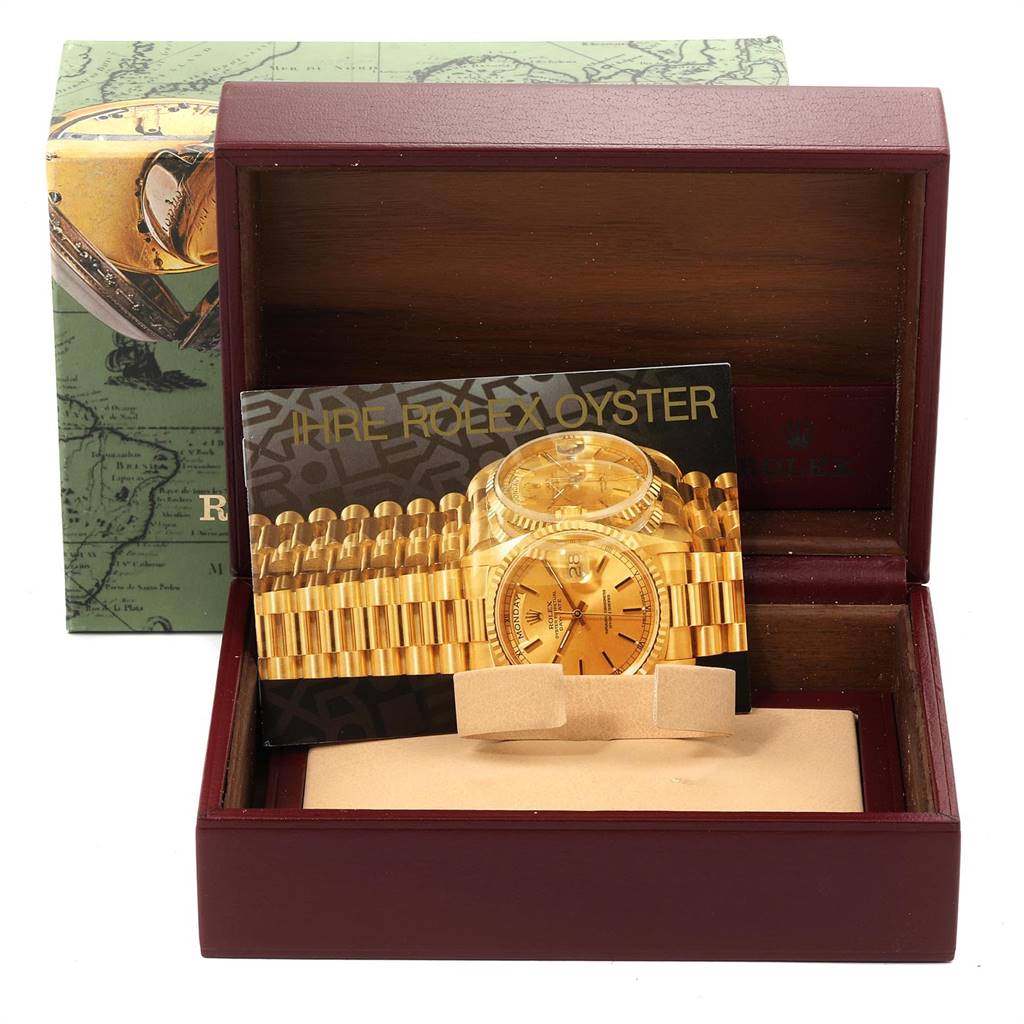 The image shows a Rolex President 18038 Men's Yellow Gold Champagne Dial 18038 Men's Yellow Gold Champagne Dial model watch case with a catalog, all placed inside a burgundy box.