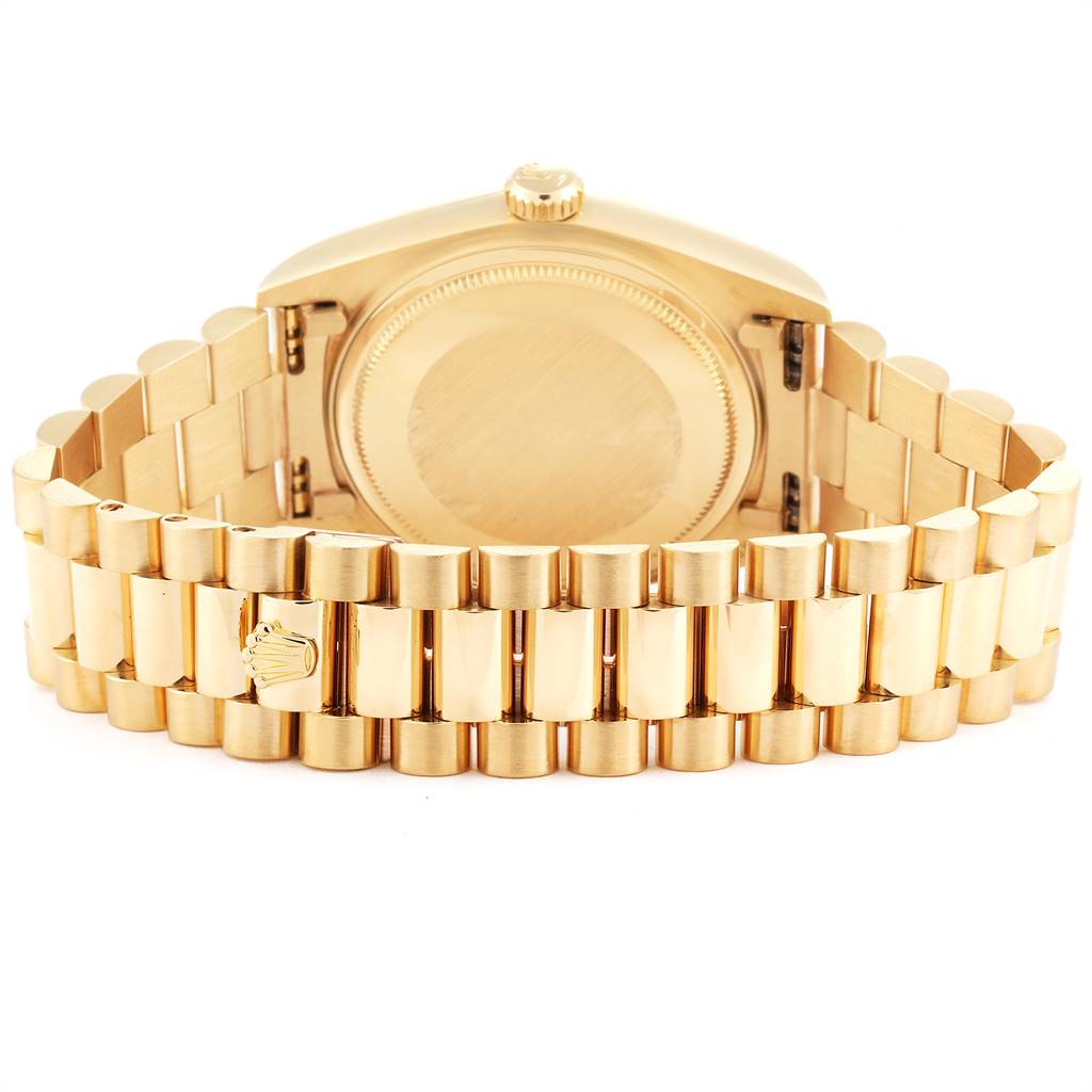 The image shows the back view of a Rolex President 18038 Men
s Yellow Gold Champagne Dial 18038 Men
s Yellow Gold Champagne Dial model watch
s case and bracelet.