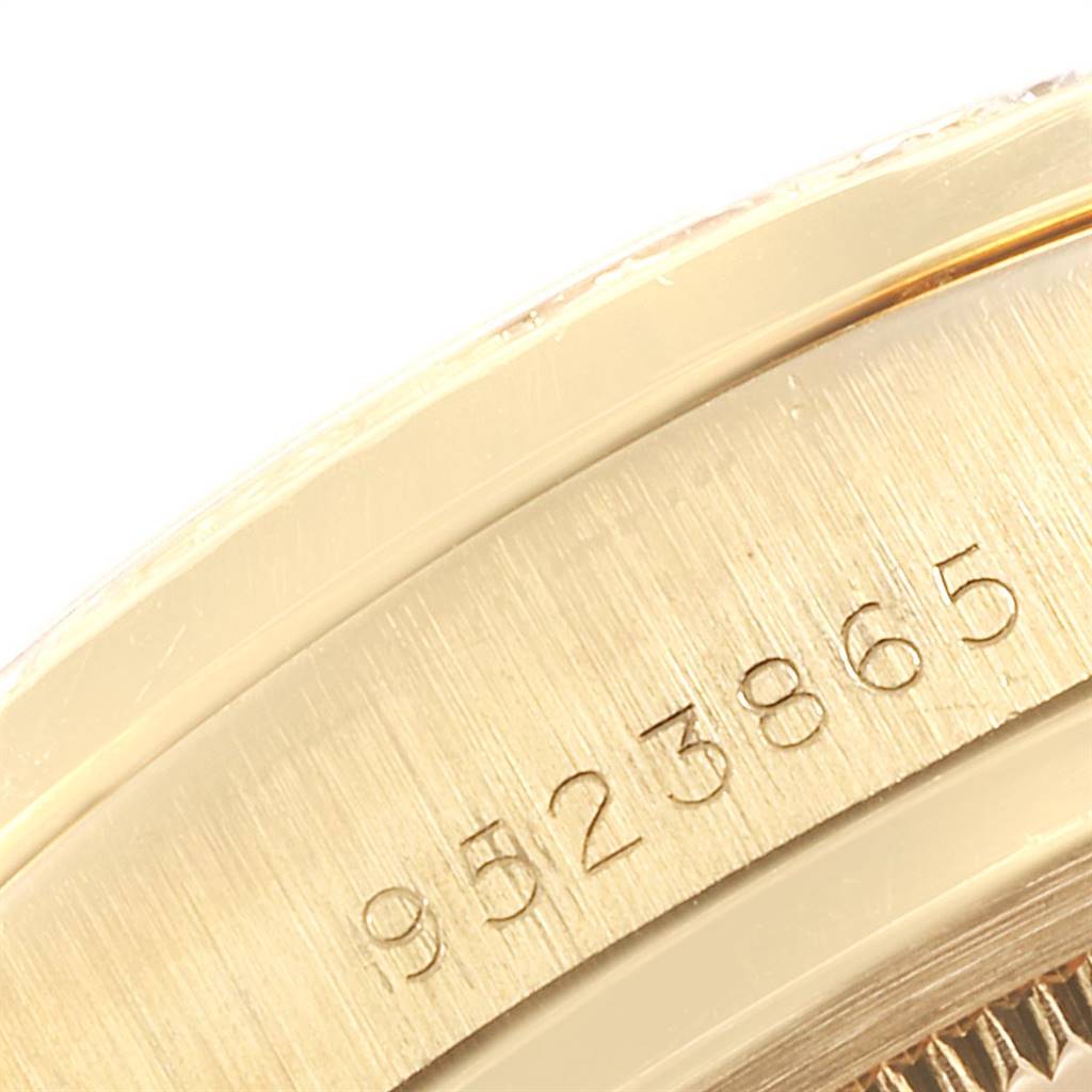 This image shows a close-up angle of the serial number engraved on a Rolex President 18138 Men
s Yellow Gold Champagne Dial 18138 Men
s Yellow Gold Champagne Dial watch case.