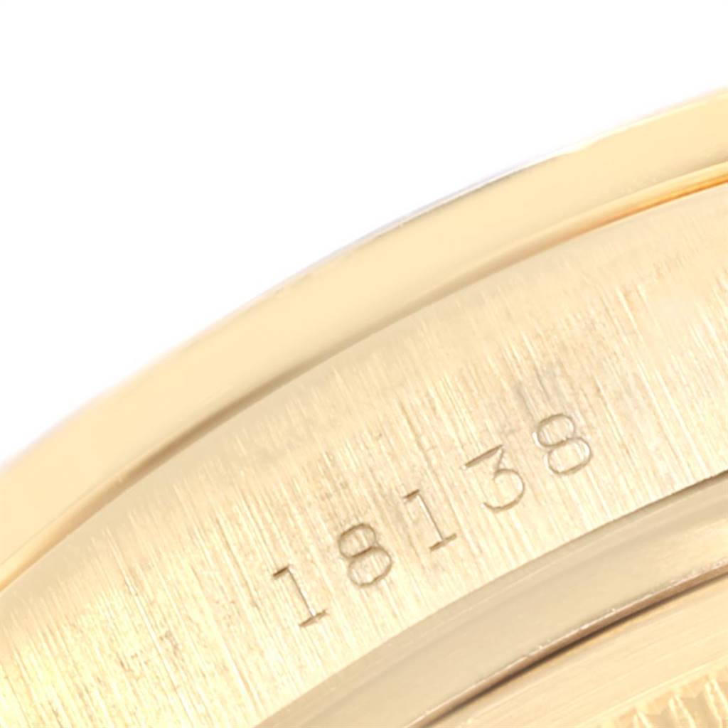 This image shows a close-up of the outer and inner bezel with the model number "18138" engraved on a Rolex President 18138 Men
s Yellow Gold Champagne Dial 18138 Men
s Yellow Gold Champagne Dial watch.