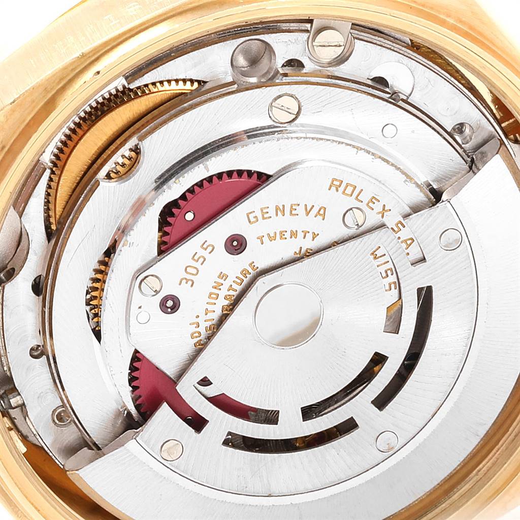 This image shows a close-up view of the internal mechanical movement of the Rolex President 18138 Men
s Yellow Gold Champagne Dial 18138 Men
s Yellow Gold Champagne Dial model watch.