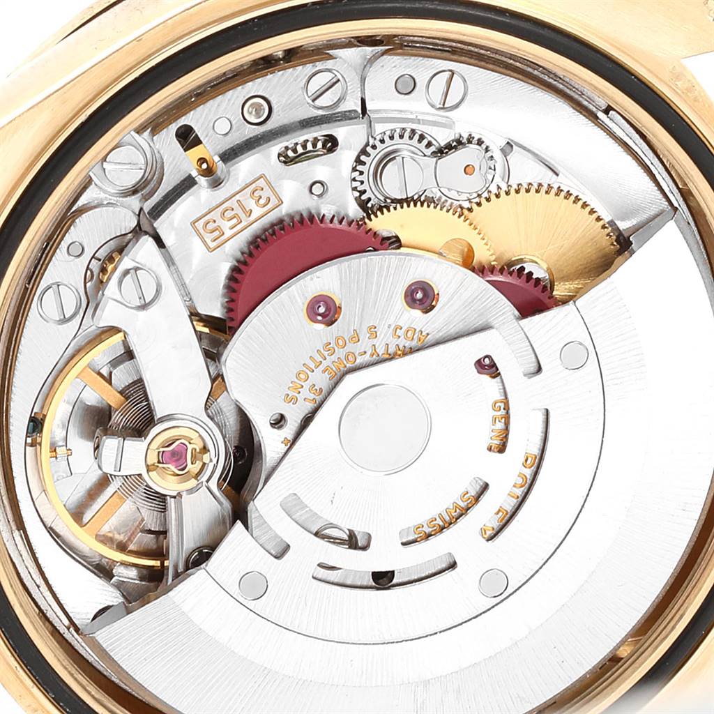 This image shows the internal mechanism and parts of a Rolex President 118348 Men
s Yellow Gold Mother of Pearl Dial 118348 Men
s Yellow Gold Mother of Pearl Dial model watch from a close-up, top-down angle.