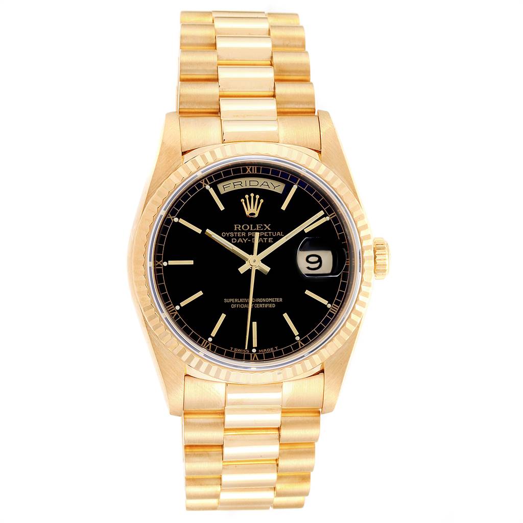The image shows a Rolex President 18238 Men's Yellow Gold Black Dial 18238 Men's Yellow Gold Black Dial model watch from a frontal angle, displaying its gold band, black dial, and day-date window.