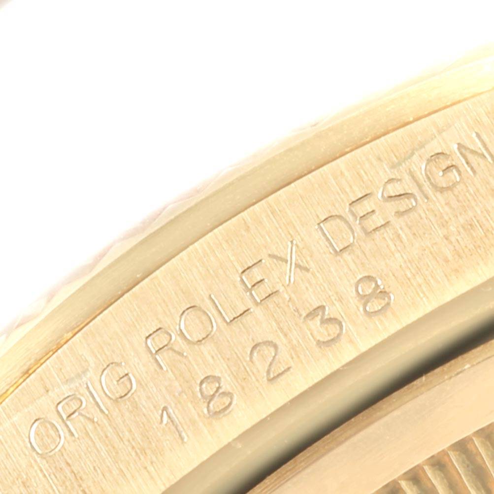 This image shows the case side with engraved text of the Rolex President 18238 Men
s Yellow Gold Champagne Dial 18238 Men
s Yellow Gold Champagne Dial model watch.
