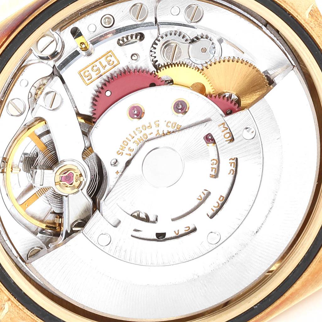 This close-up, top-down view shows the intricate movement mechanics inside a Rolex President 18238 Men
s Yellow Gold Champagne Dial 18238 Men
s Yellow Gold Champagne Dial model watch.