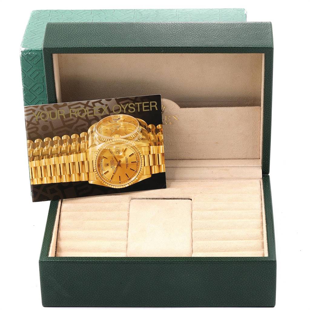 The image shows a Rolex President 18238 Men
s Yellow Gold Champagne Dial 18238 Men
s Yellow Gold Champagne Dial watch box and literature, with an empty watch space inside.