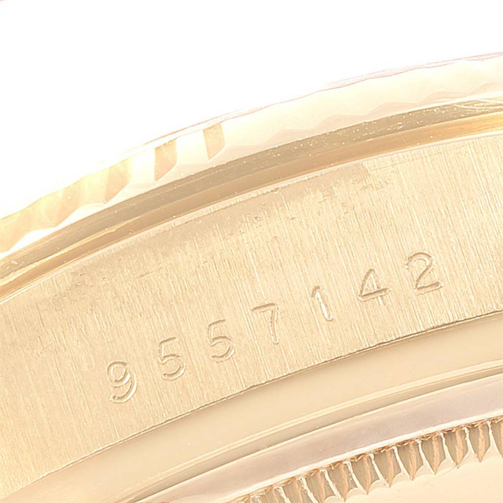 This image shows a close-up angle of the serial number engraved on the side of a Rolex President 18038 Men
s Yellow Gold Champagne Dial 18038 Men
s Yellow Gold Champagne Dial model watch.