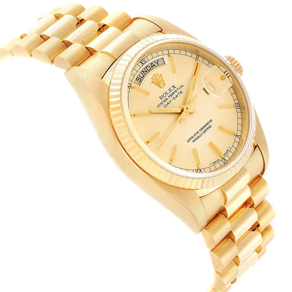 The image shows a Rolex President 18038 Men
s Yellow Gold Champagne Dial 18038 Men
s Yellow Gold Champagne Dial watch at a side angle, highlighting the gold bracelet and face with day and date features.